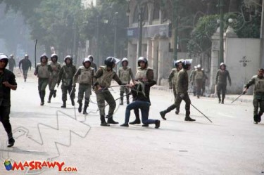 Egyptian army assaulting a woman
